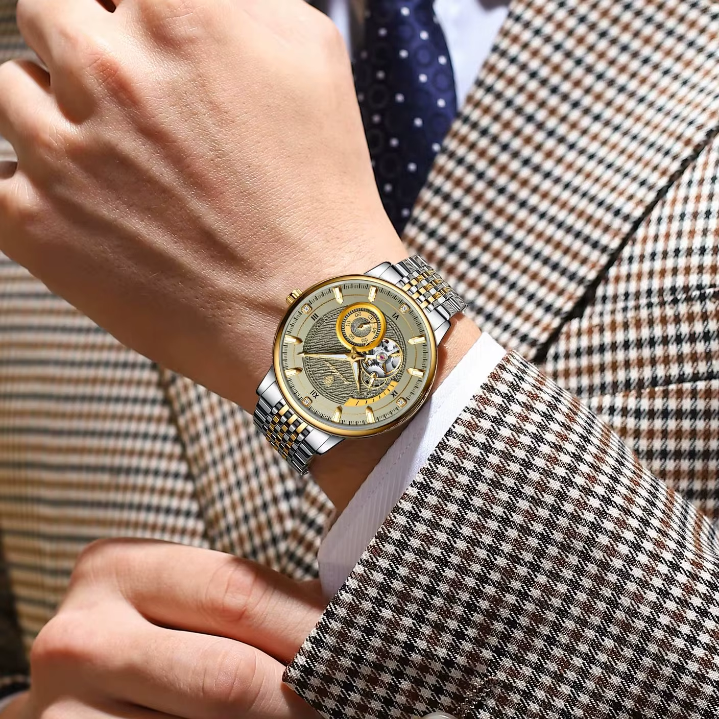 POEDAGAR 1416 tourbillon watch with two-tone steel bracelet on wrist with plaid jacket
