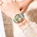 POEDAGAR 794 womens 31mm quartz watch with champagne dial and two-tone steel bracelet on wrist