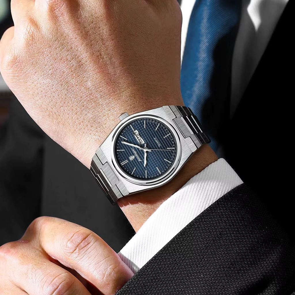 POEDAGAR 821S-1 mens quartz watch with blue textured dial and silver steel bracelet on wrist with dark suit