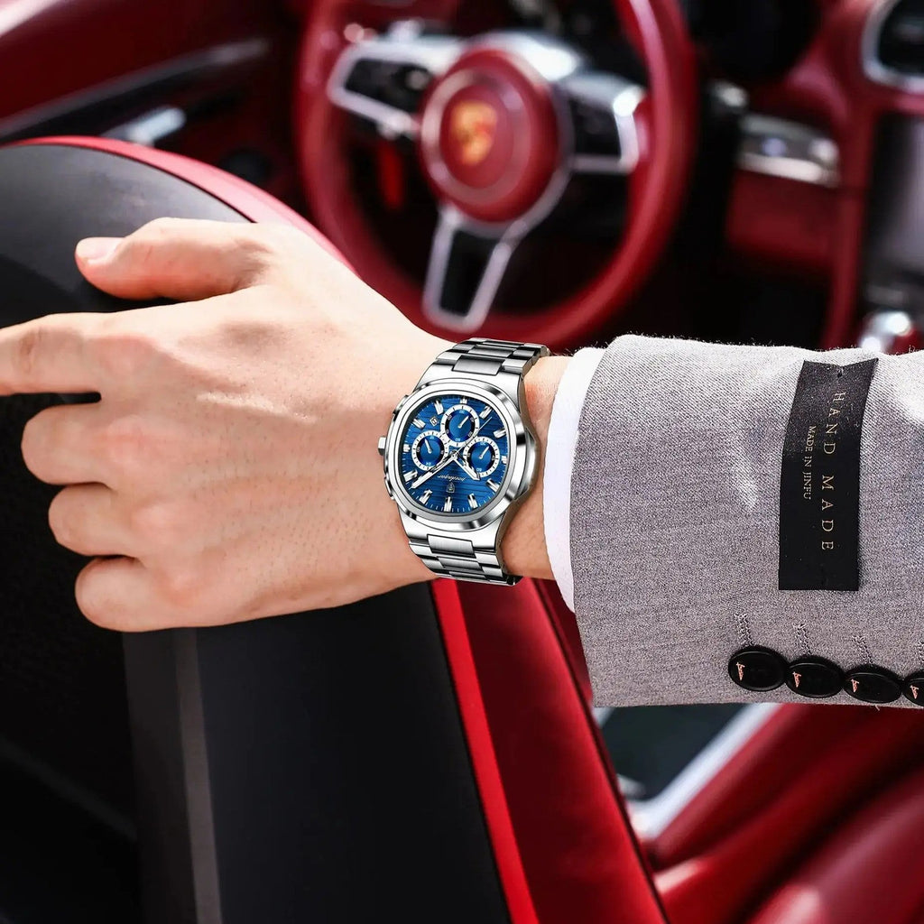 POEDAGAR 834 mens chronograph with blue dial and steel bracelet on wrist with Porsche steering wheel