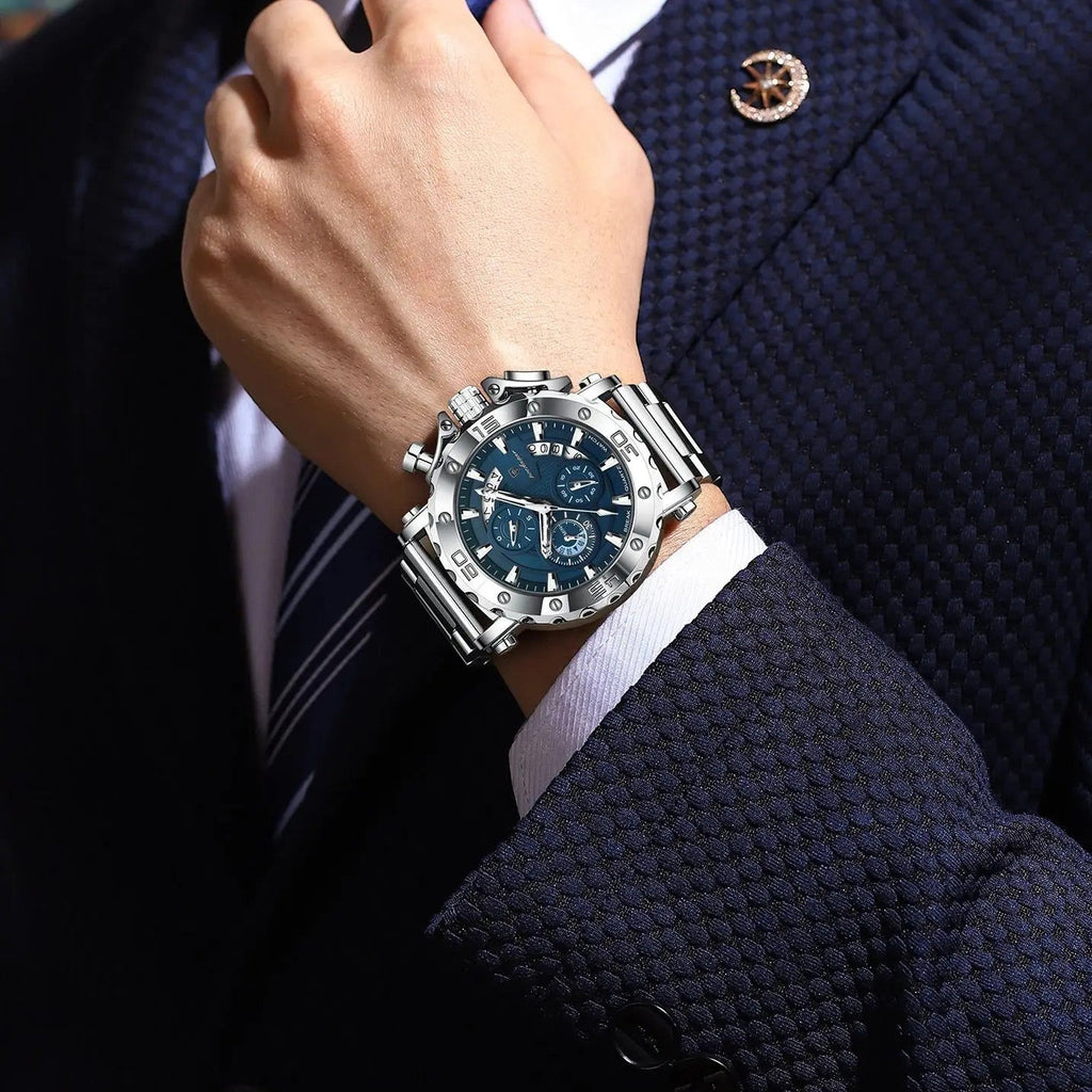 POEDAGAR 892 men's chronograph quartz watch with blue dial and steel bracelet worn with navy suit