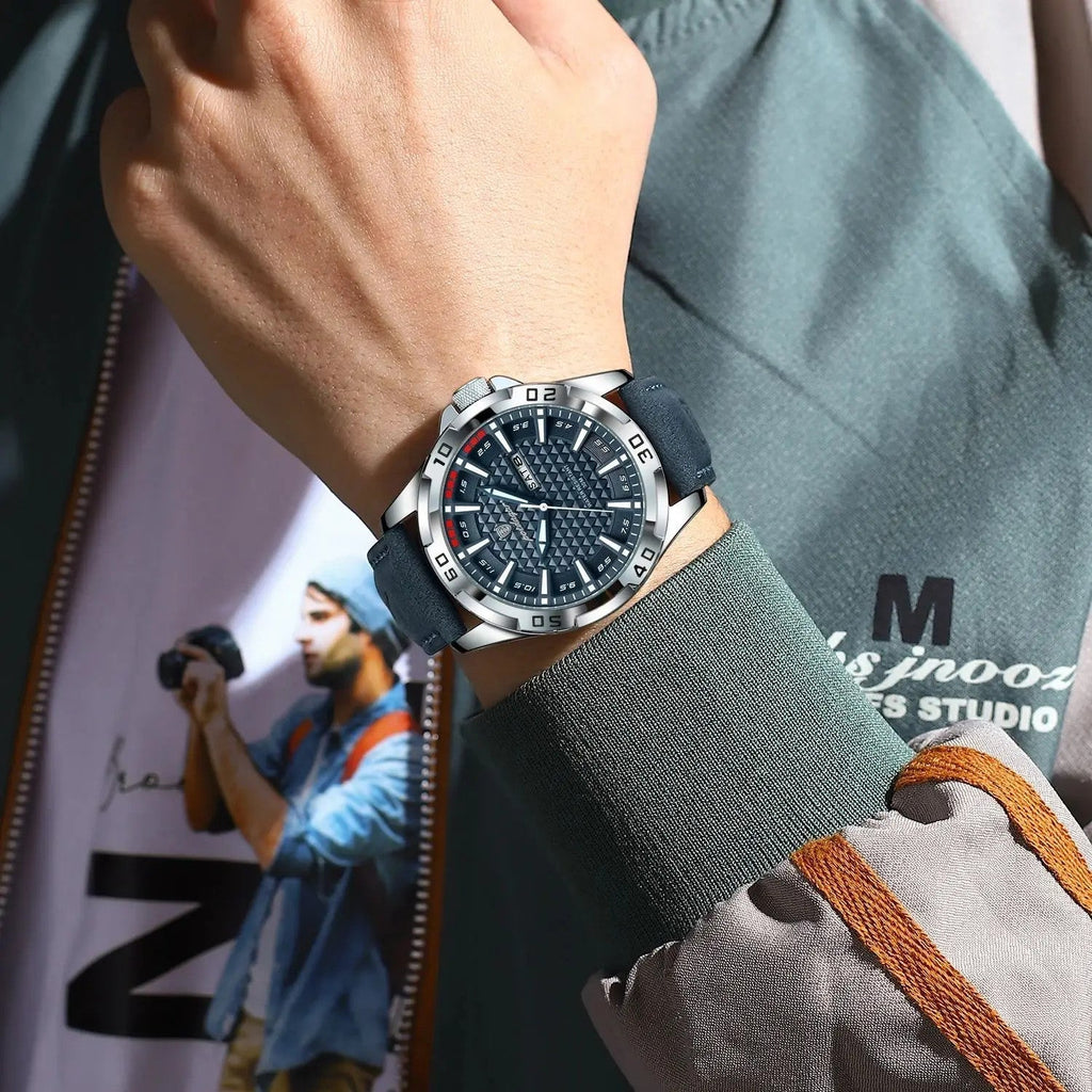 POEDAGAR 895 men's leather sports watch with grey dial and blue suede strap worn on wrist
