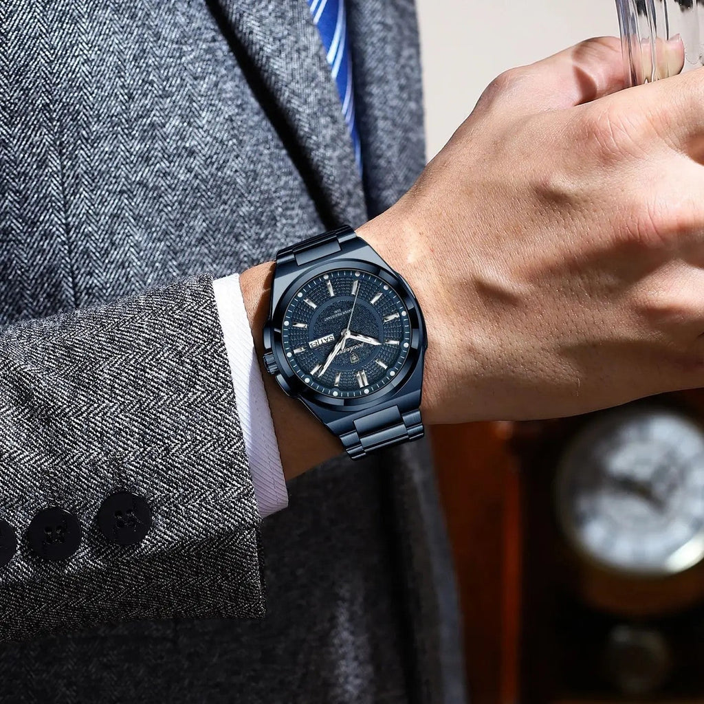 POEDAGAR 896 men's sport quartz watch with blue dial worn on wrist holding glass with grey suit