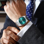 POEDAGAR 930-GN men's quartz watch with green dial worn on wrist with suit cuff