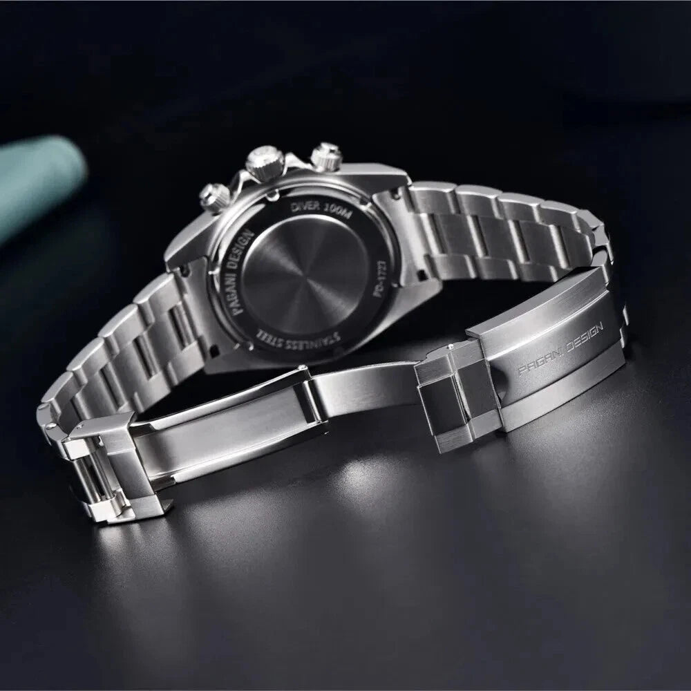 Silver wristwatch with detailed design on a dark background