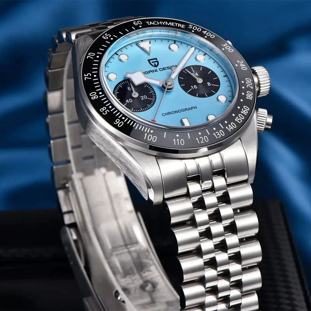 Silver watch with a blue face on a dark background