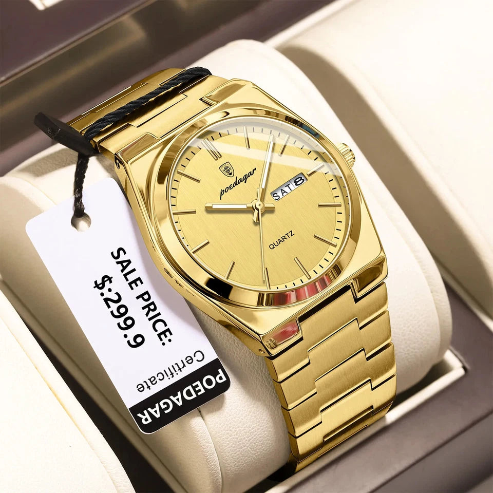 Gold watch with a visible sale tag on a white cushion
