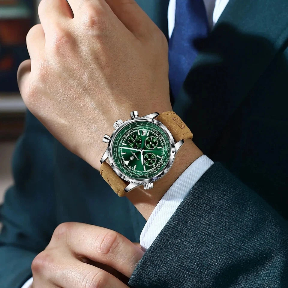 Close-up of a person wearing a green watch with a brown leather strap.