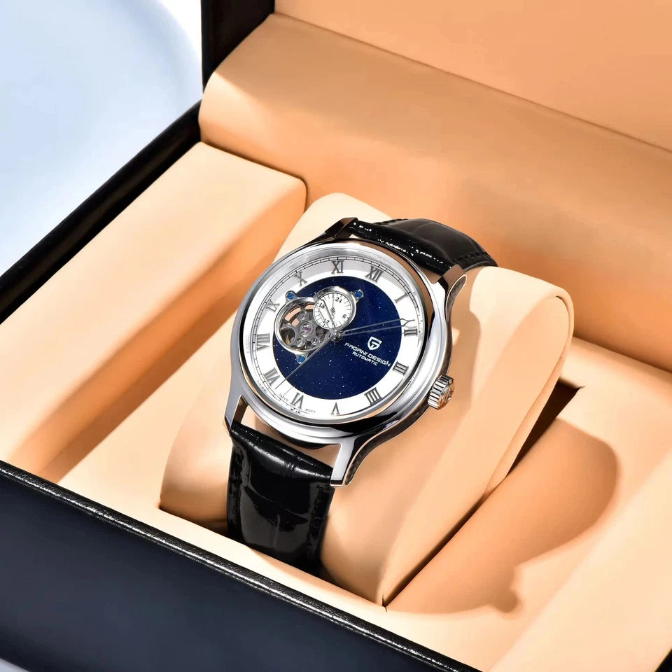 Luxury watch with black strap and blue face in a beige box
