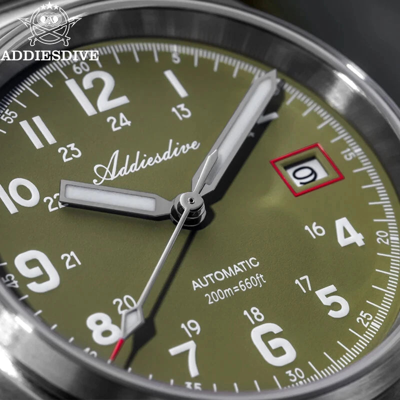 Close-up of a green watch face with 'Addiesdive' branding
