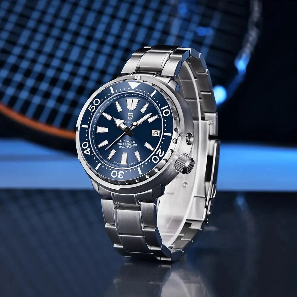 Pagani Design PD-1695 men's luxury automatic tuna diver watch with blue dial, silver bracelet on reflective surface