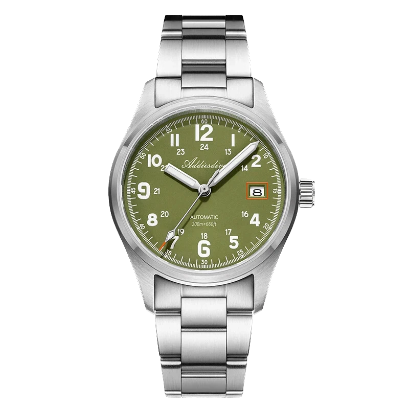Watch with green face and silver metal strap on white background