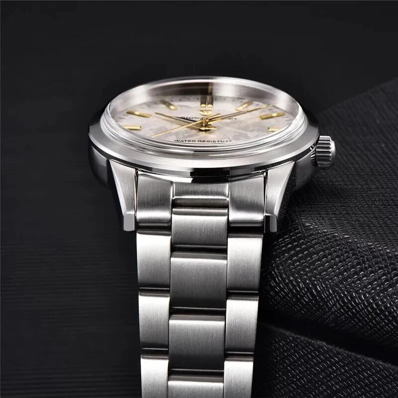 Silver wristwatch with a dark background