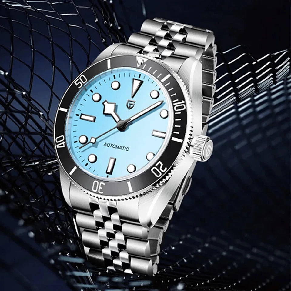 Silver wristwatch with a blue face on a dark background