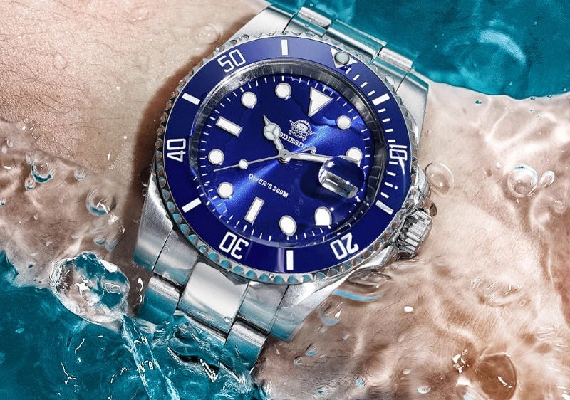 Blue and silver watch with water splashes and 'Addiesdive' branding.