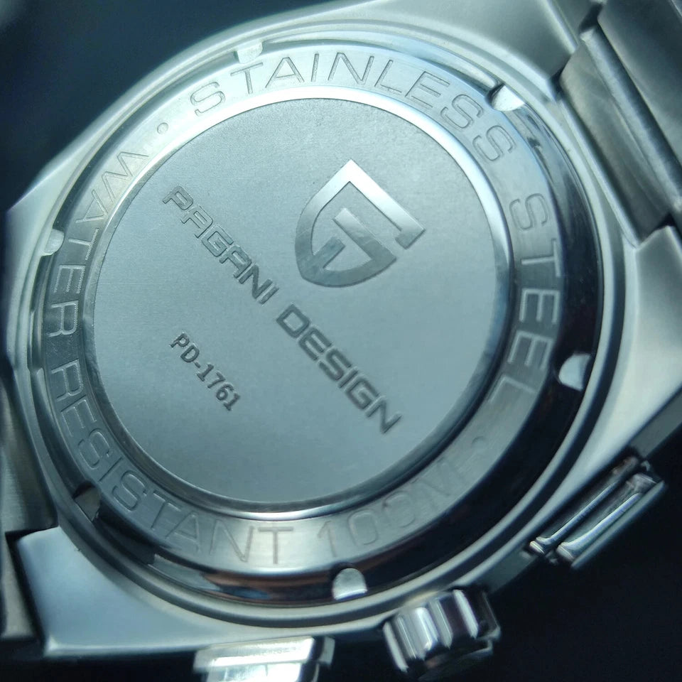 Close-up of a Pagani Design watch case with branding and material details.
