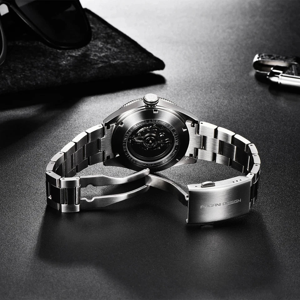 Silver watch with a unique design on a dark surface