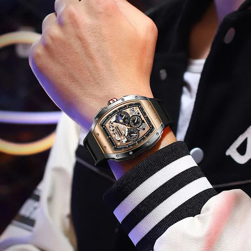 Luxury watch on a person's wrist with a blurred background