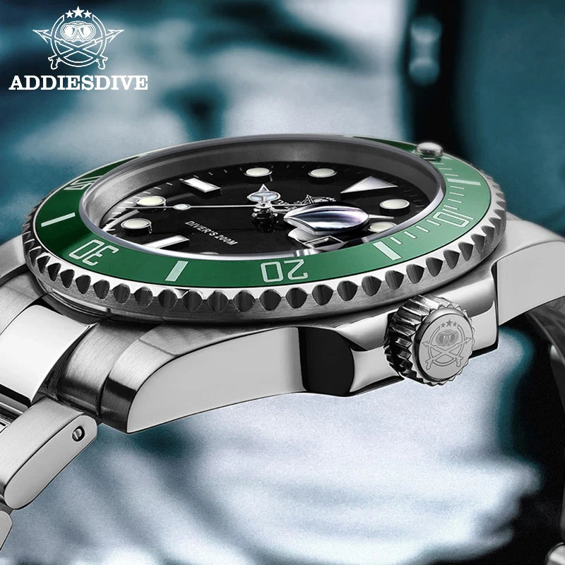 Close-up of a wristwatch with a green bezel and black face, featuring the AddiesDive brand.