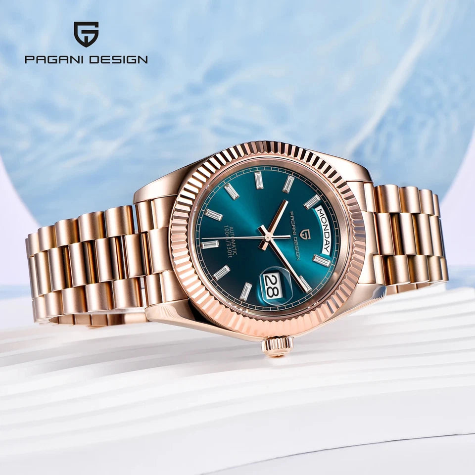 Rose gold watch with blue dial on a light background, branded 'Pagani Design'.