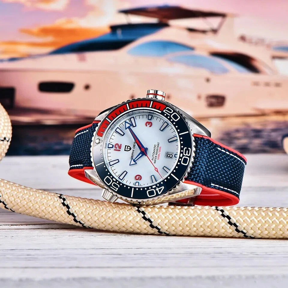 Watch with a blue and red strap on a wooden surface with a blurred boat in the background