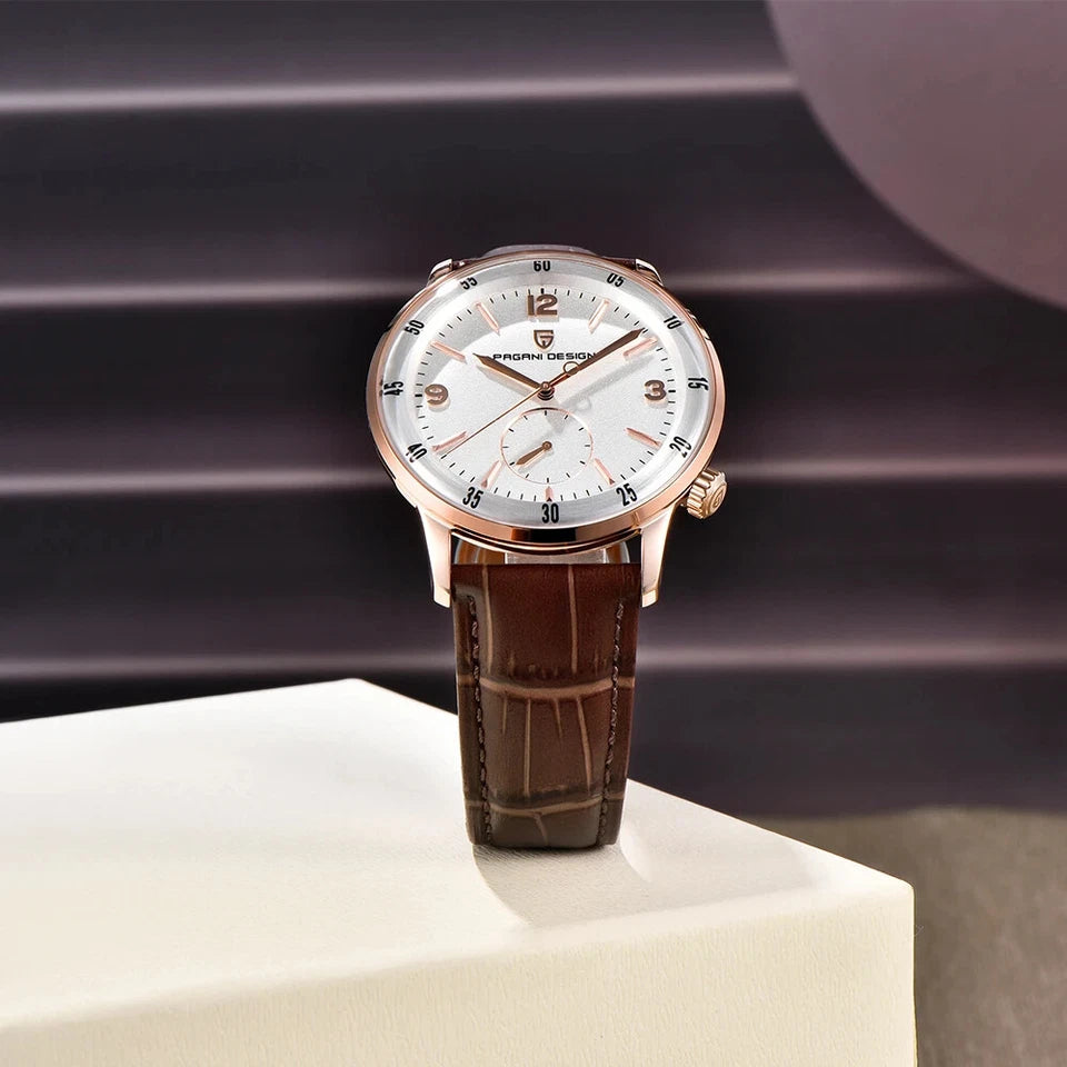 Luxury watch with brown leather strap on a white stand against a blurred background