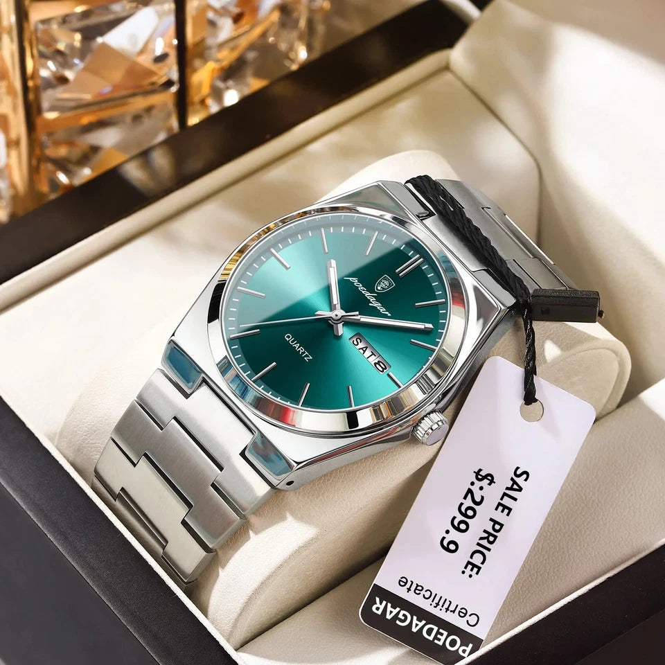 Watch with a green face and silver case on a white box, featuring a sale tag.