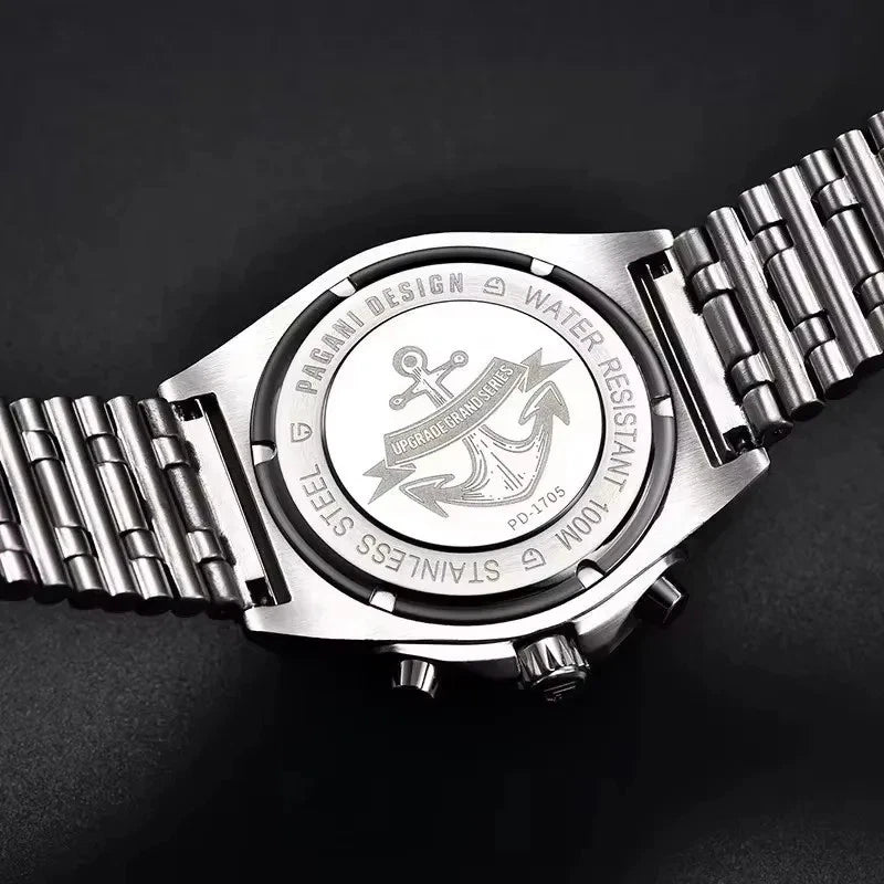 Silver watch with detailed design on a dark background