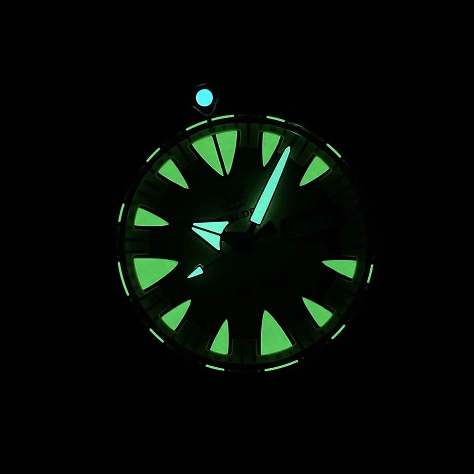 Glowing green watch face on a black background