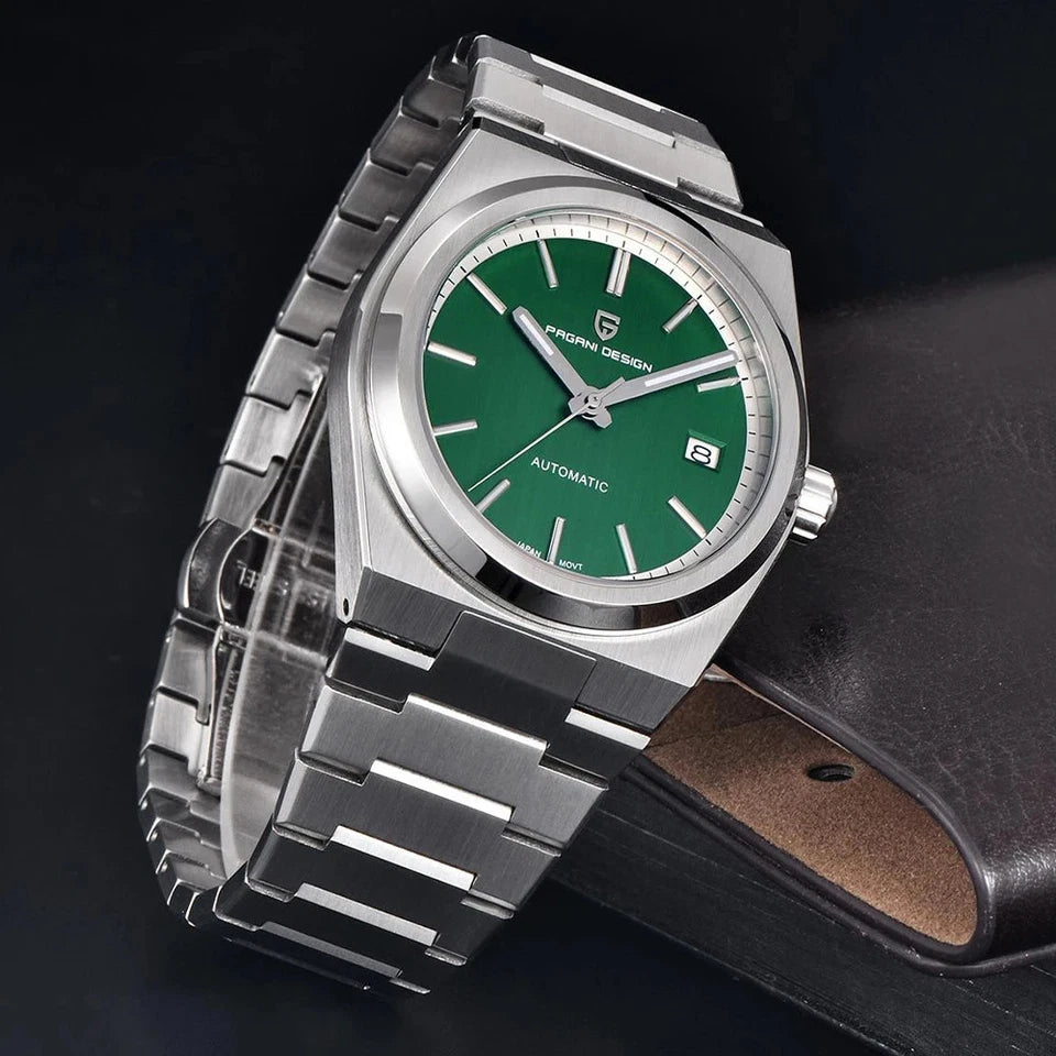 Watch with green dial and silver metal strap on a dark background