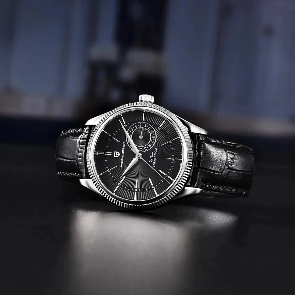 Black wristwatch with a detailed face on a dark surface