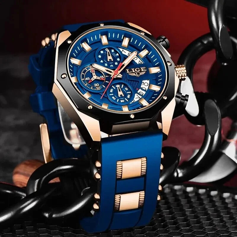 Luxury watch with blue strap and detailed face on a dark background