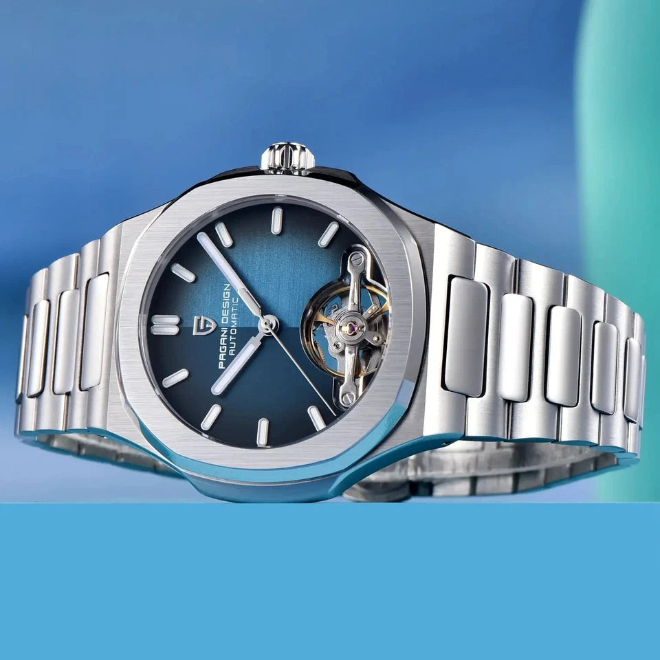 Silver watch with a blue face on a blue background