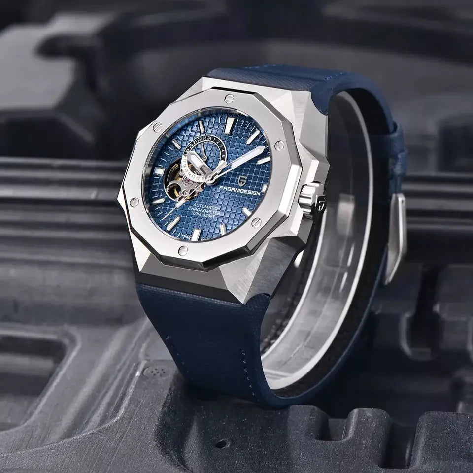 Luxury watch with blue strap and detailed face on a textured black background