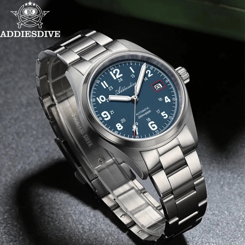 Silver wristwatch with blue dial on a dark background, featuring the ADDIESDIVE brand.