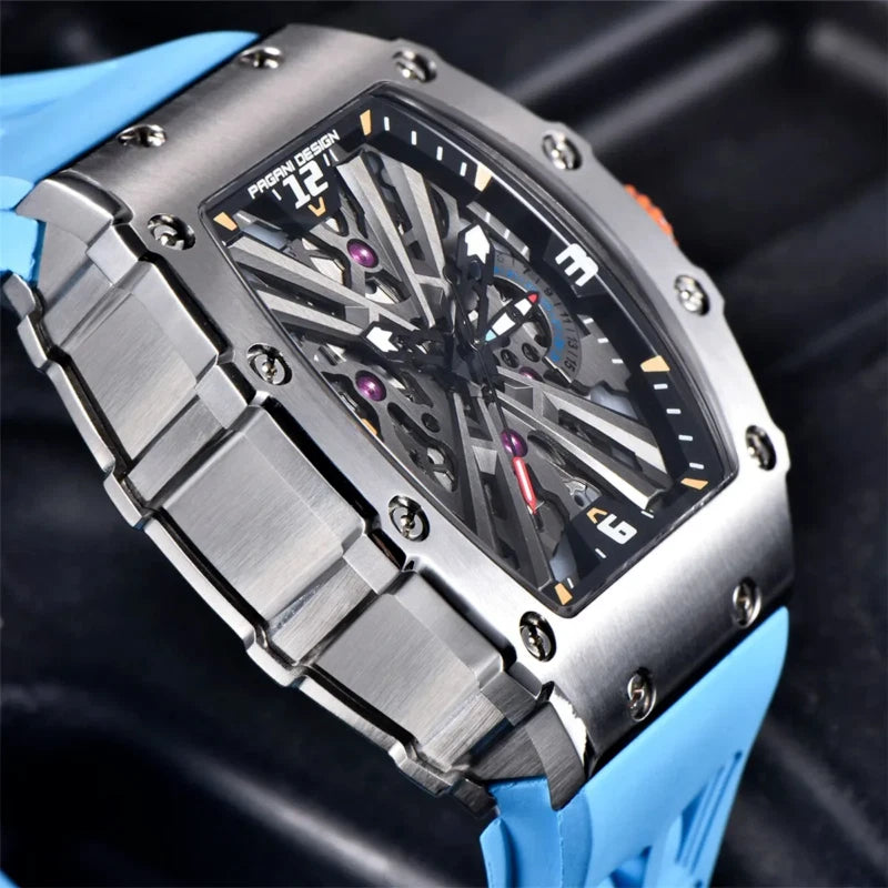 Luxury watch with blue strap and transparent face on a blurred background
