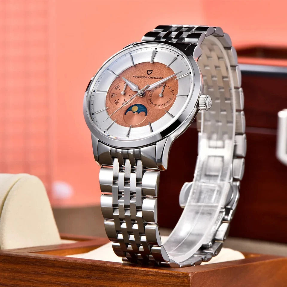 Silver wristwatch with a detailed face on a wooden surface