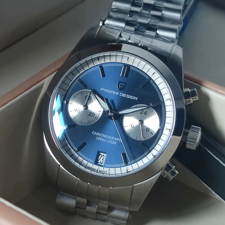 Silver Pagani Design watch with blue dial on a light background
