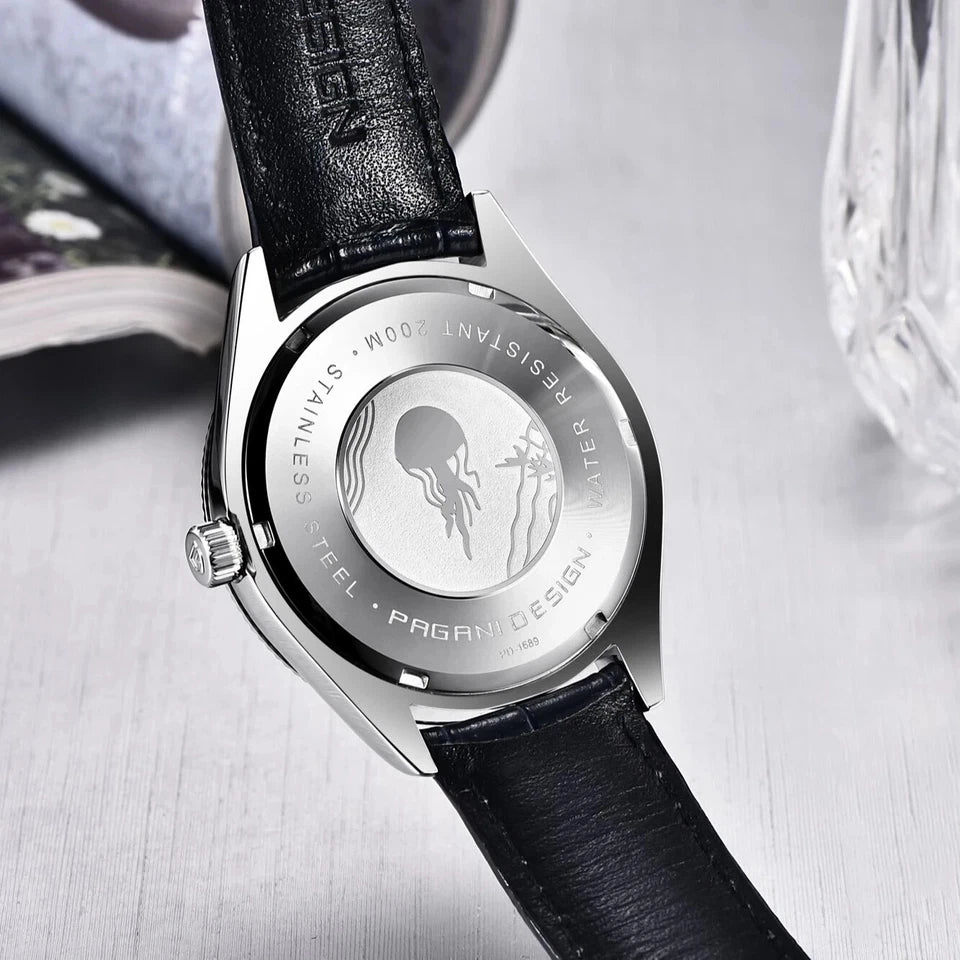 Watch with black leather strap and silver case on a light gray background