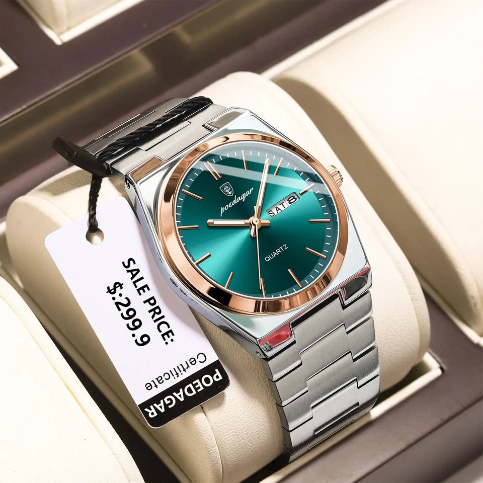 PoeCaggr watch with green face and silver band on a beige cushion, price tag visible.