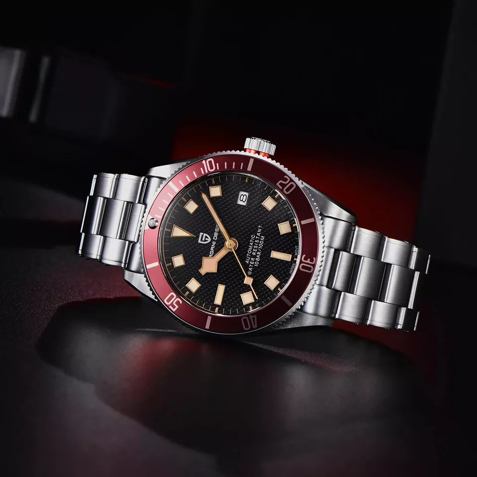 Luxury watch with a red and black dial on a dark background