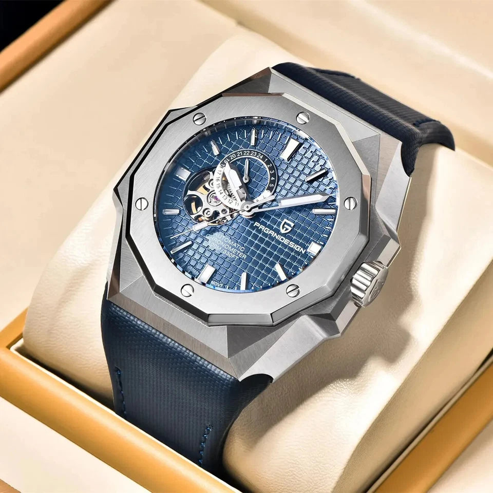 Luxury watch with blue face and leather strap in a beige box