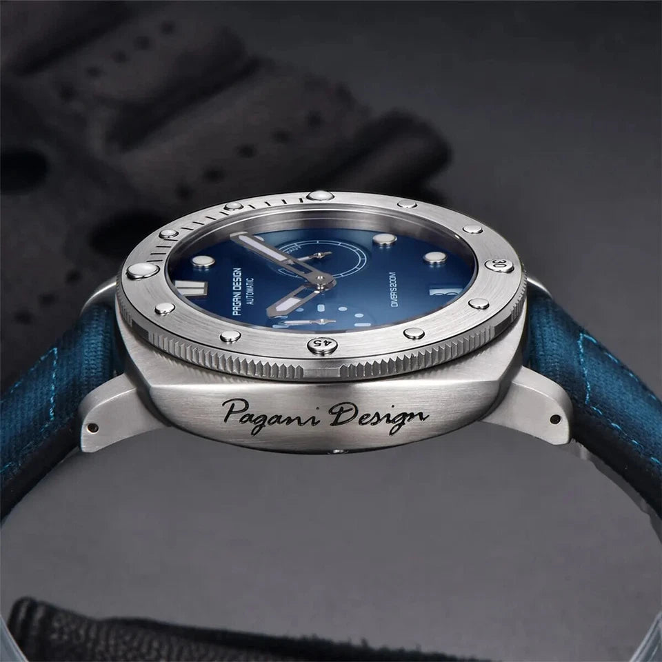 Pagani Design watch with blue face and silver case on a dark background