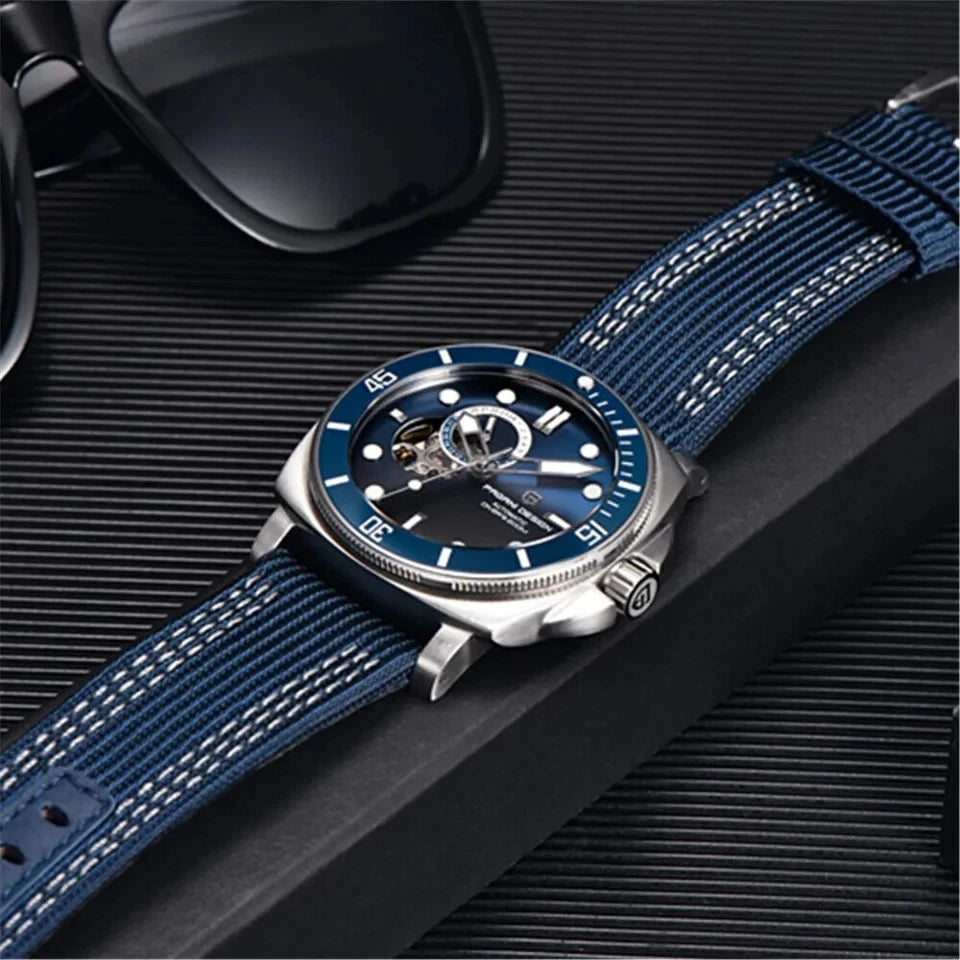 Blue watch with a detailed face on a black textured surface