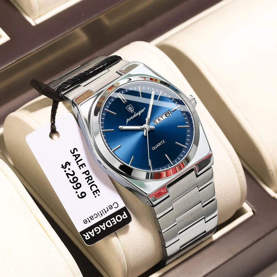 Patek Philippe watch with blue face and silver band on a display stand, featuring a sale tag.