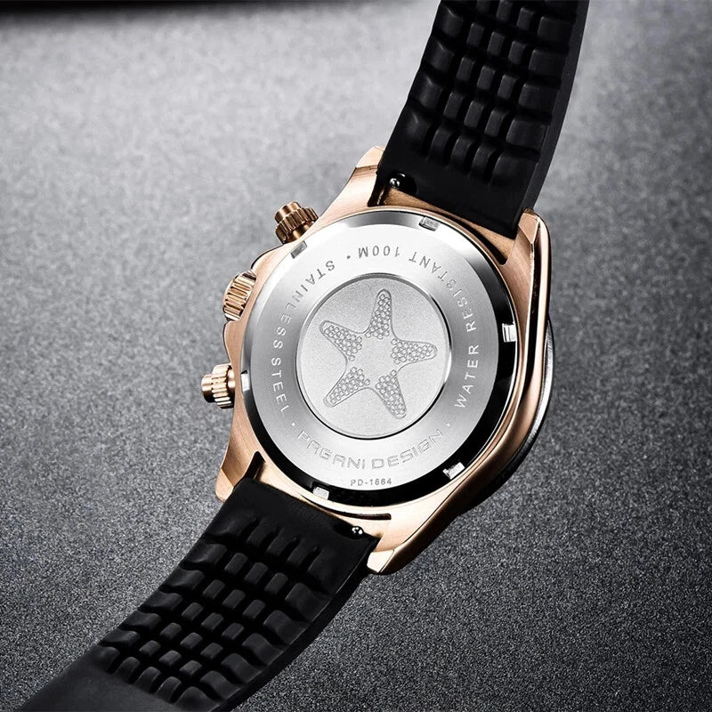 Wristwatch with black strap and rose gold case on a gray background