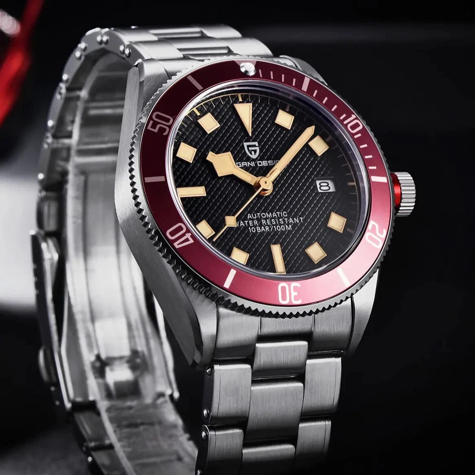Silver watch with a black face and red accents on a dark background