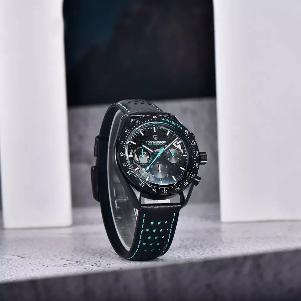 Black wristwatch with blue accents on a white surface