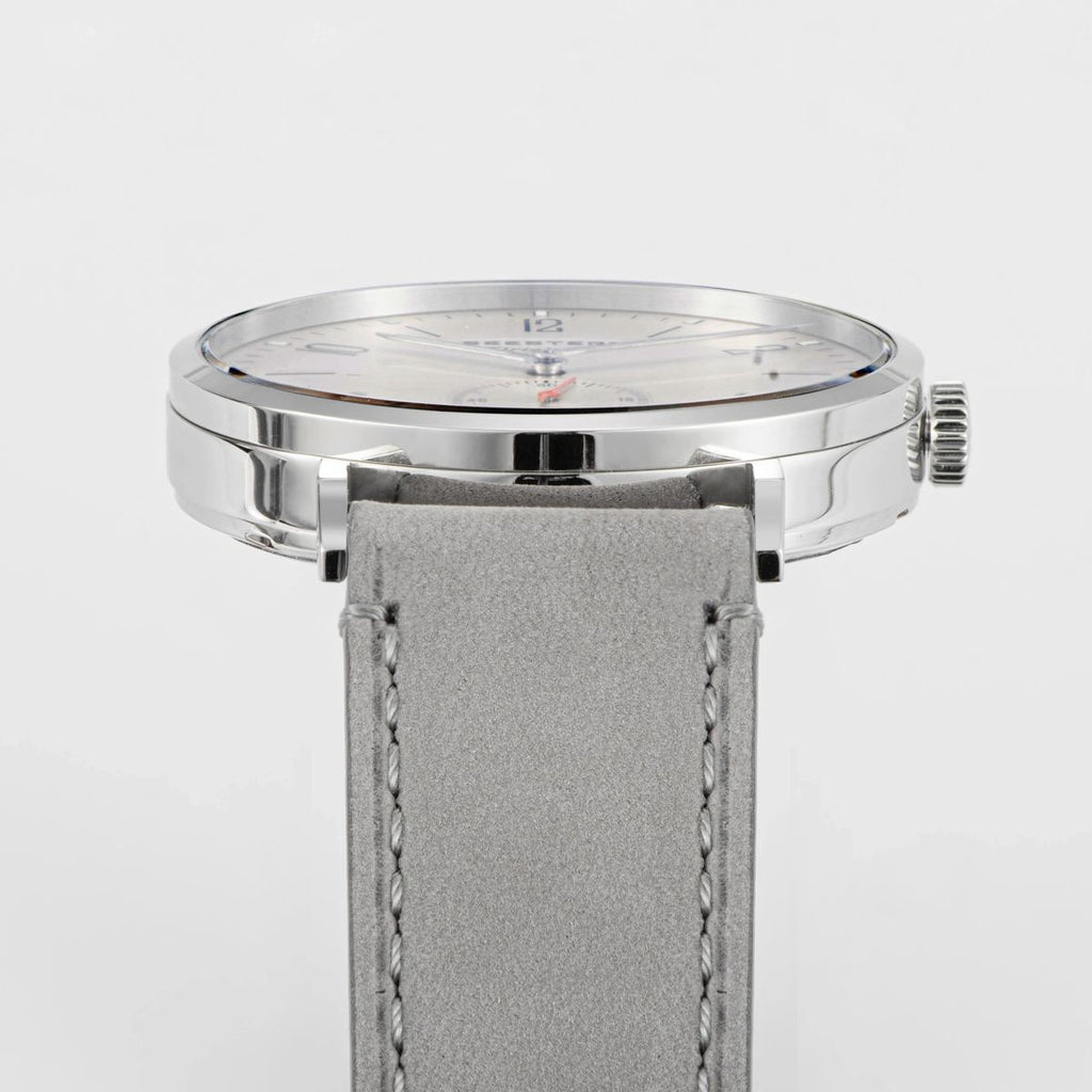 Seestern S382 cream-dial dress watch side profile showing slim polished steel case and grey suede strap