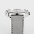 Seestern S382 cream-dial dress watch side profile showing slim polished steel case and grey suede strap